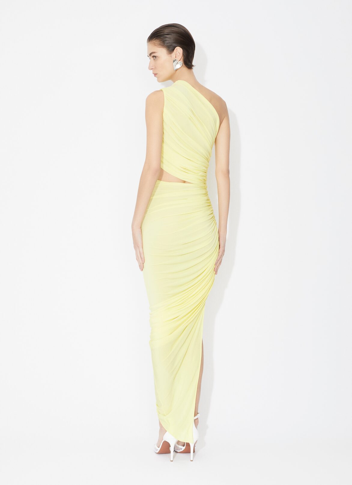 ASYMMETRICAL SECOND SKIN CUT-OUT DRESS ALAÏA LIGHT YELLOW ASYMMETRICAL SECOND SKIN CUT-OUT DRESS